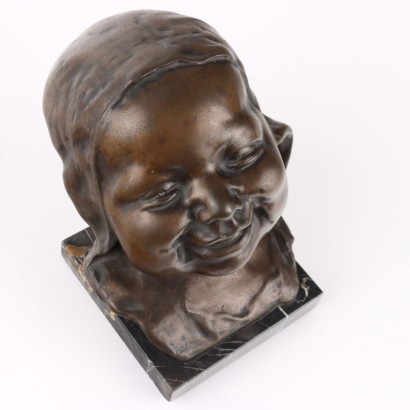 Kinderkopf aus Bronze