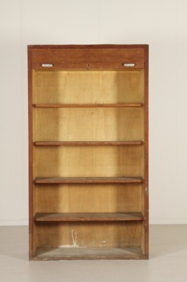 File cabinet with roll-front.