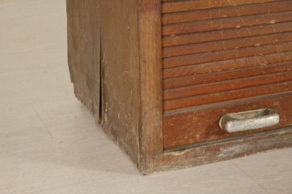 File cabinet with roll-front.