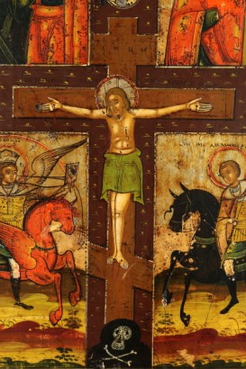 Detalle del icono ruso cuatripartito con el Cristo crucificado