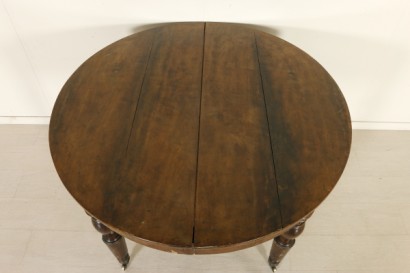 Round extendable table top