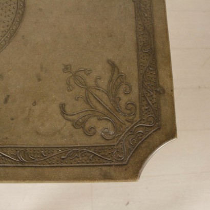 Coffee table with carved stone-detail
