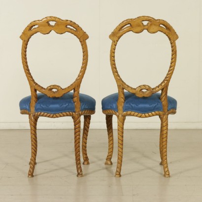 Pair of carved chairs to the rope and back