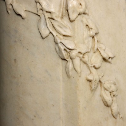 Busto femenino y columna Liberty en M