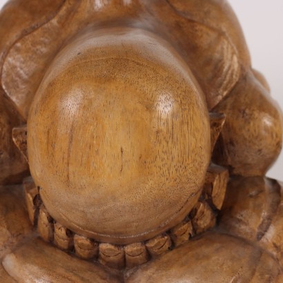 Sculpture en bois de Bouddha pleureur
