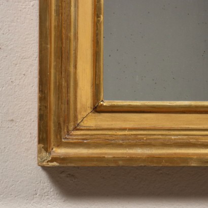 Miroir sculpté et doré