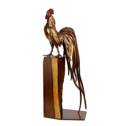 Escultura de metal de gallo