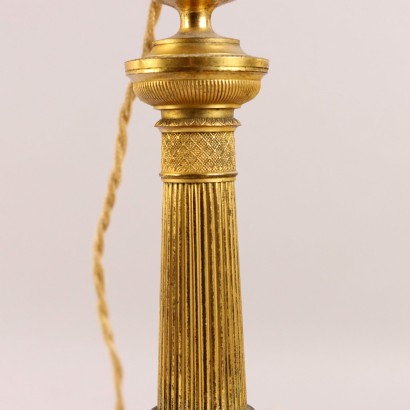 Par de candelabros de bronce dorado