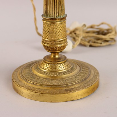 Par de candelabros de bronce dorado