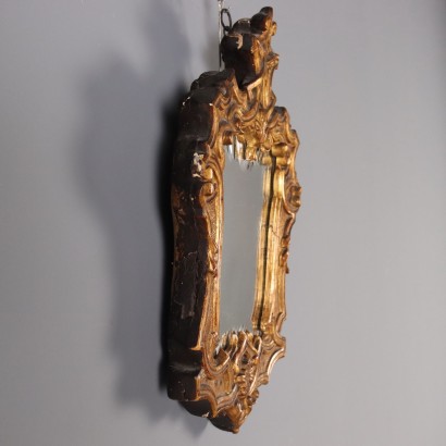 Espejo de madera tallada y dorada