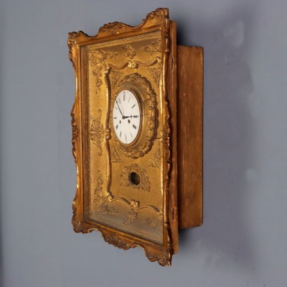 Horloge murale à pendule