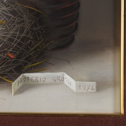 Dipinto di Proferio Grossi,Natura morta,Proferio Grossi,Proferio Grossi,Proferio Grossi,Born in 1923 on the hills of Parma PRoferio Grossi after classical studies in Parma moved to Milan, where he attended the Luigi Bocconi University of Commerce for a short time and then enrolled at the Brera Academy. Here he became the favored student of Atanasio Soldati, his fellow townsman and leader of Geometric Abstractionism. In 1948 he joined the MAC (Movimento Arte Concreta) and in 1954 held his first solo exhibition at Studio B 24 in Milan, where in 1957 he then organized the 1st Concrete Art Review at the Schettini Gallery. In the following years Proferio Grossi achieved well-deserved success with the adoption of object painting, in an aesthetic discourse he carried on until the last days of his life, alternating it with the abstract trend. Numerous are the solo, group, and retrospective exhibitions held by Proferio Grossi in Italian and foreign galleries. For his artistic merits, he was appointed member of the Academy of Fine Arts of Parma and other qualified Italian academies. Proferio Grossi also executed portraits of famous personalities, murals, and frescoes, both in the Parma and Milan areas. He died in Parma in 2000.
