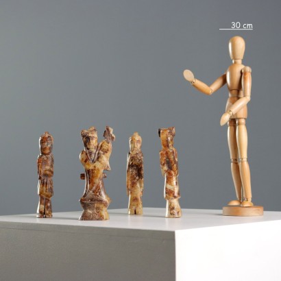 Group of Four Stone Musicians