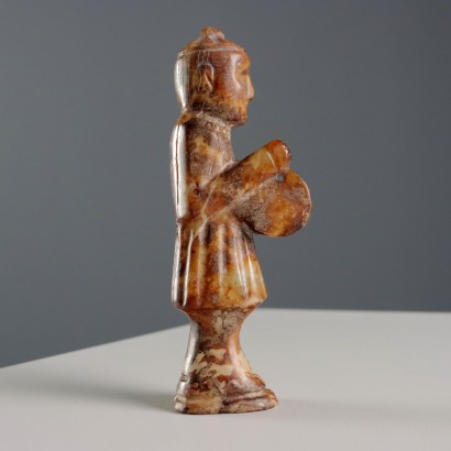 Group of Four Stone Musicians