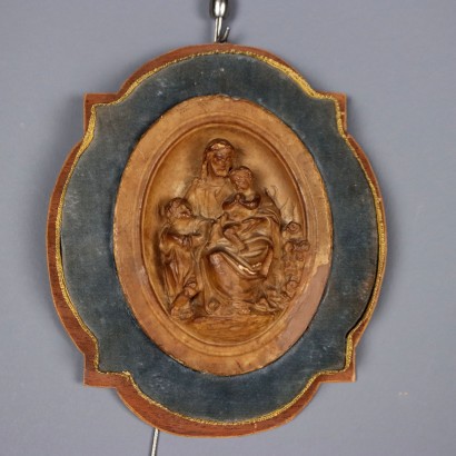 Pair of Patinated Plaster Bas-Reliefs