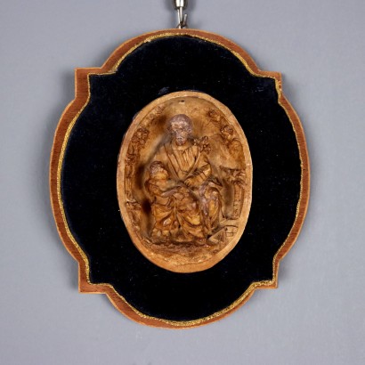 Pair of Patinated Plaster Bas-Reliefs