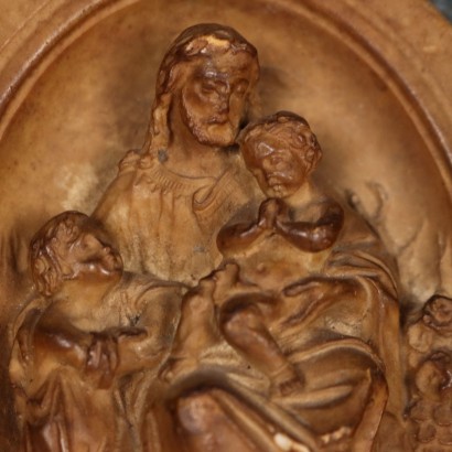 Pair of Patinated Plaster Bas-Reliefs
