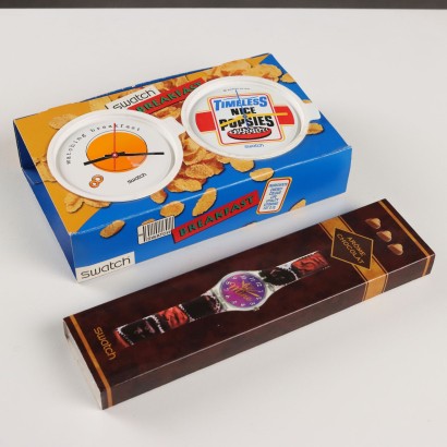 Gruppo di Tre Orologi Swatch a Tema