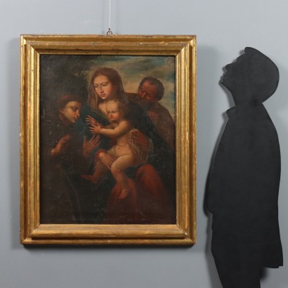 Pintura de la Sagrada Familia con San Francisco, Sagrada Familia con un santo franciscano