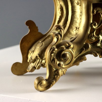 Horloge triptyque en bronze doré