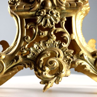 Horloge triptyque en bronze doré