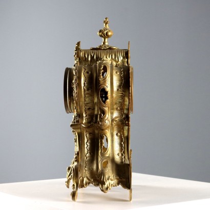 Horloge triptyque en bronze doré