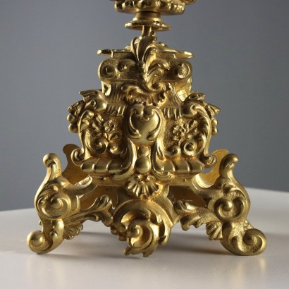 Horloge triptyque en bronze doré