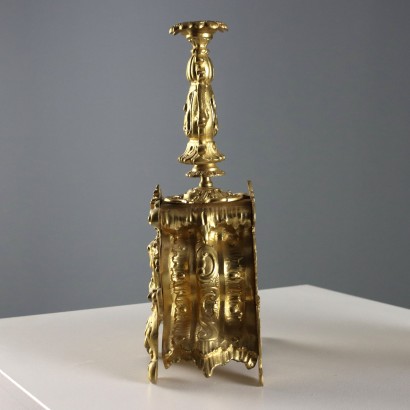 Horloge triptyque en bronze doré