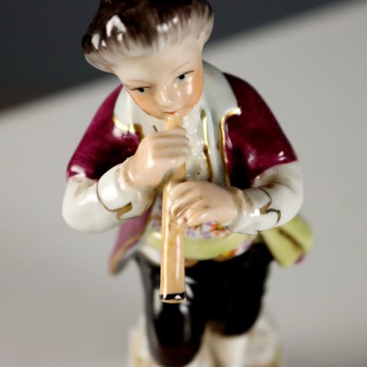 Paire d'enfants en porcelaine fabriquée