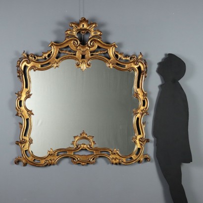SPIEGEL, geschnitzter und vergoldeter Holzspiegel