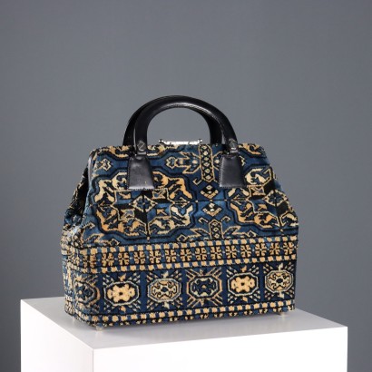 Bolsa de viaje vintage de cuero y terciopelo