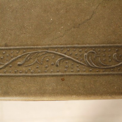 Coffee table with carved stone-detail