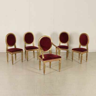Grupo de cuatro sillas de estilo neoclásicos y sillón