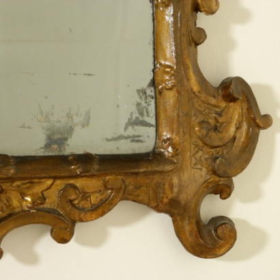 Detalle de espejo tallado