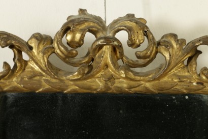 Par de espejos-detalle de tallado y dorado