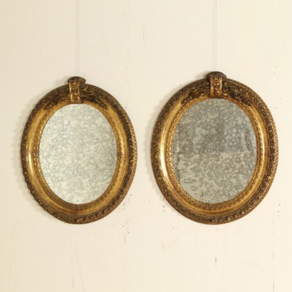 Pair of carved and gilded frames