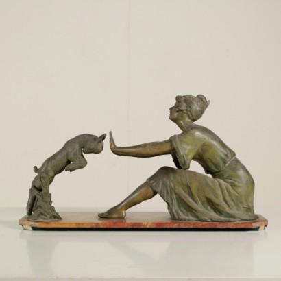 di mano in mano, scultura in antimonio, giovane donna e capretto, scultura maxim geo, maxim geo, antimonio maxim geo, scultura giovane donna, scultura di giovane donna