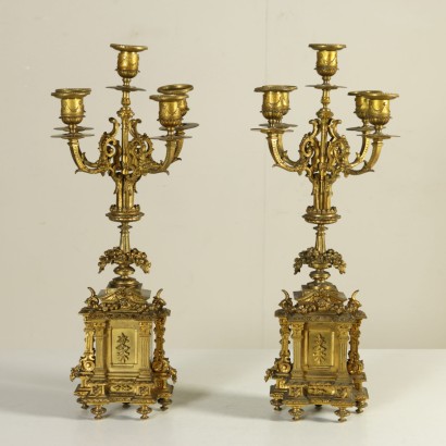 Pair of candlesticks in gilded bronze