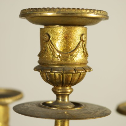 Pair of candlesticks in gilded bronze - detail