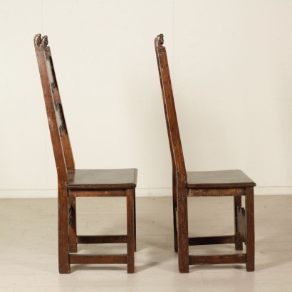 Pair of chairs carved