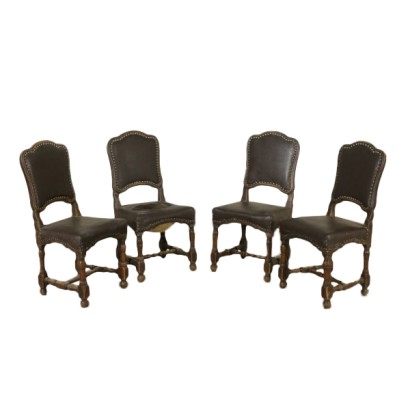 Group of four chairs spool