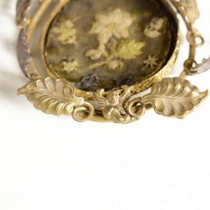 Portaorologio in bronzo - particolare Portaorologio in bronzo - particolare