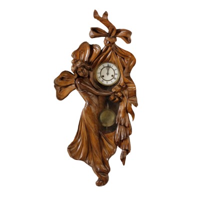 di mano in mano, orologio a pendolo, orologio da parete, orologio intagliato, orologio femminile, orologio in legno, orologio numeri romani, Orologeria Frazzei Leone, orologio 900, orologio italia