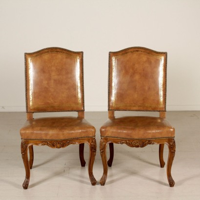 Poltrona e coppia di sedie in stile