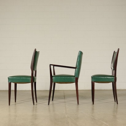 Suite de trois Chaises Bois teinté Cuir synthétique Italie Années 50