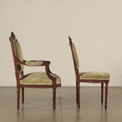 Set of six Carved Chairs and Armchair Italy 20th Century