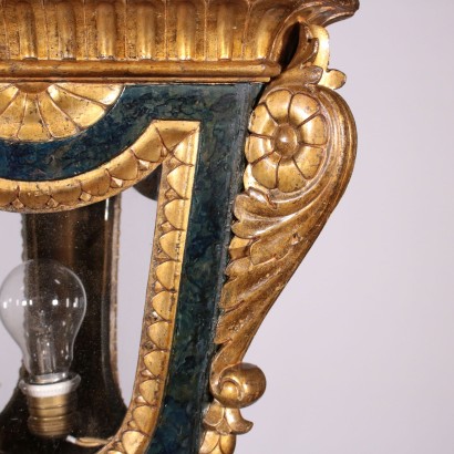 Pair of lanterns in the carved and gilded wood