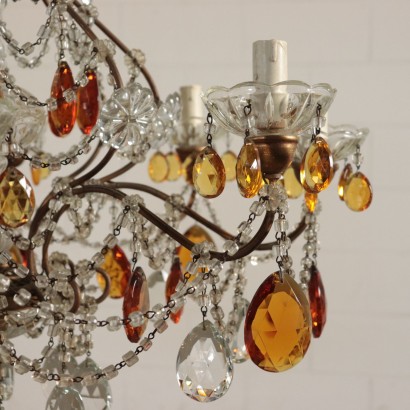 Lustre à huit Bras Fer doré Verre Ambre Italie Première'900