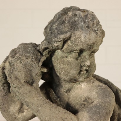 Escultura de jardín con Putto