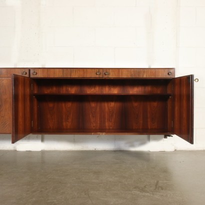 Sideboard pensile ad ante battenti e cassetti, legno impiallacciato palissandro.